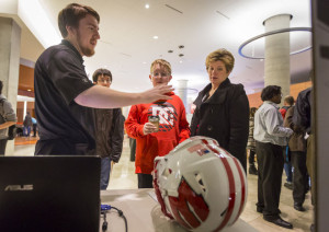 A UW senior medical engineer explains how the smart helmet can aid to player safety by using sensor technology.Credit: Andy Manis/Journal Sentinel 