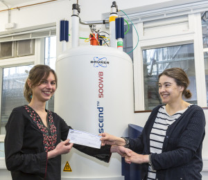 University of Cambridge Ph.D. candidate, Raphaële Clément (left), receives her ECS 2015 Summer Fellowship award check from advisor & ECS member, Professor Clare Grey (right).