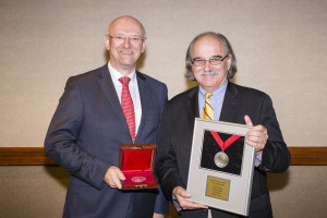 ECS President Daniel Scherson (right) presenting Martin Winter the Carl Wagner Memorial Award.