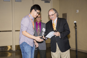 First place winner, Xiaoxing Xia accepting his certificate.