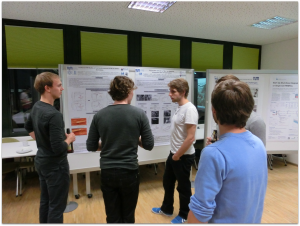 Discussion during poster session. From left to right: Maximilian Bernt, Lukas Seidl, Thomas Mittermeier, Ludwig Asen, Benedikt Brandes (hidden).