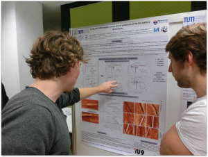 Lukas Seidl explaining his poster to Thomas Mittermeier during the poster session at the ECS Student Chapter Munich Workshop.